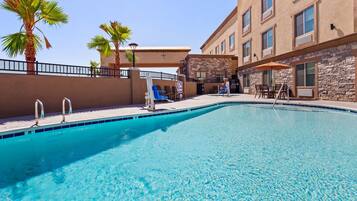 Outdoor pool, open 8:00 AM to 8:00 PM, sun loungers