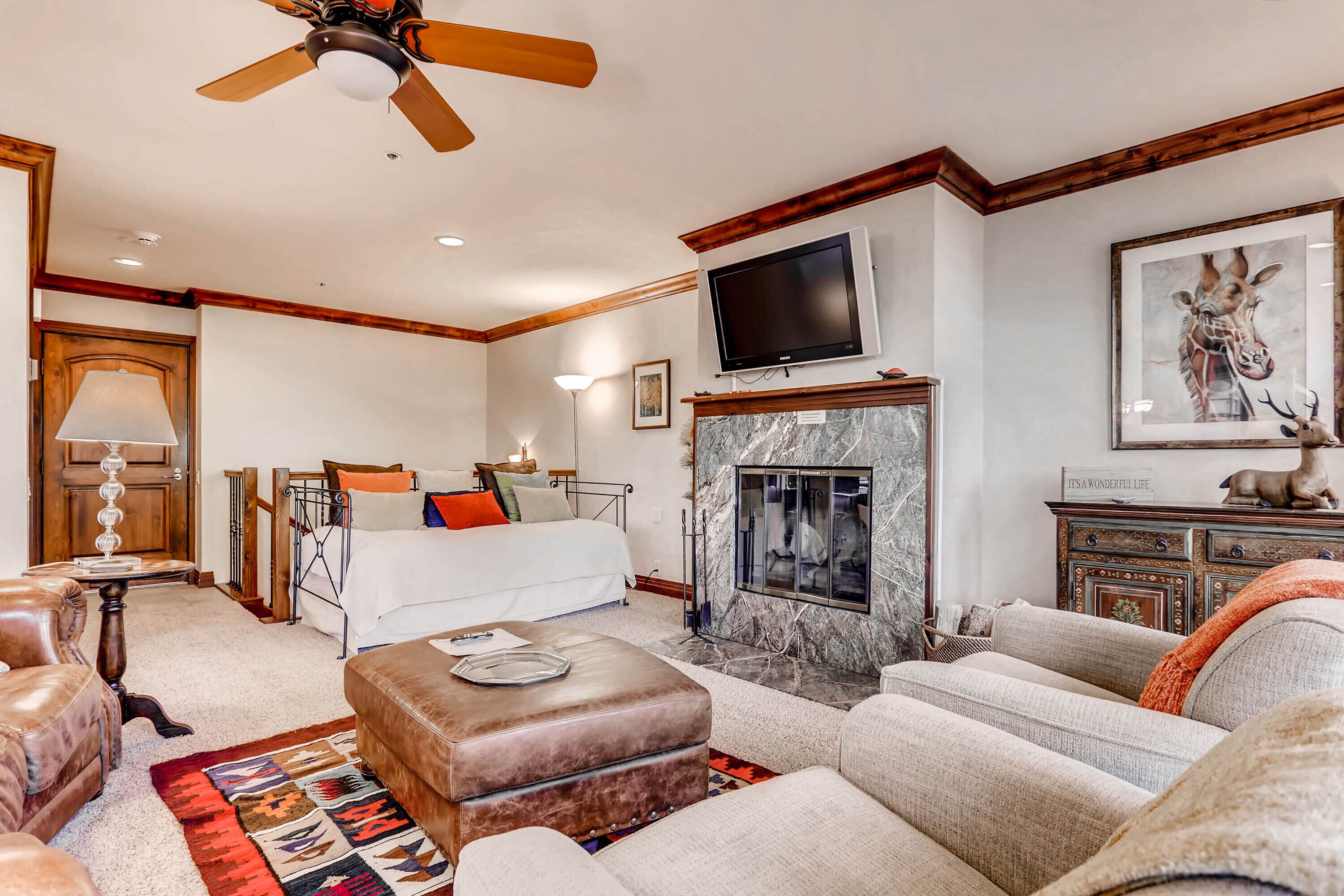 Condo, Multiple Beds (Centennial 2 Bedroom Condo unit no. 3) | Living room | TV, fireplace