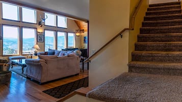 Chalet (3 Bedrooms) | Living area | TV, fireplace