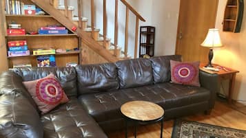 Chalet (3 Bedrooms) | Living area | TV, fireplace, foosball