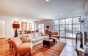 Apartment, Multiple Beds | Living area | TV, fireplace