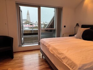 1 bedroom, desk, iron/ironing board, travel crib