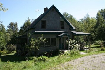 House and front gardens beckon in summer
