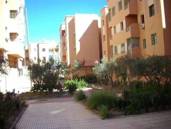 Residents can enjoy a peaceful atmosphere amidst lush greenery and modern architecture.