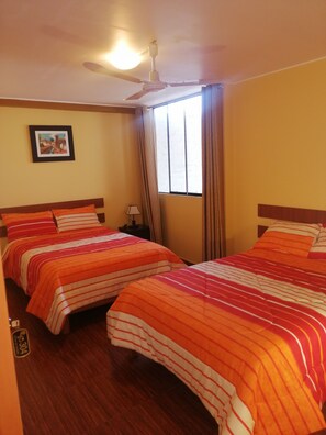 Family Room | Desk, iron/ironing board, free WiFi, bed sheets - Nasca Travel One Hostel (Nazca)
