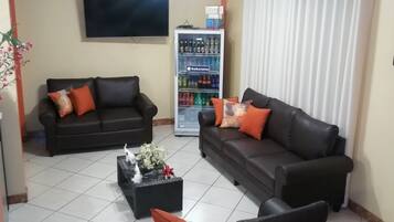 32-inch flat-screen TV with cable channels, TV