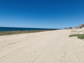 On the beach, sun loungers