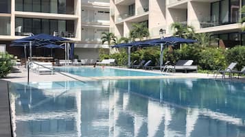 Outdoor pool, pool umbrellas, pool loungers