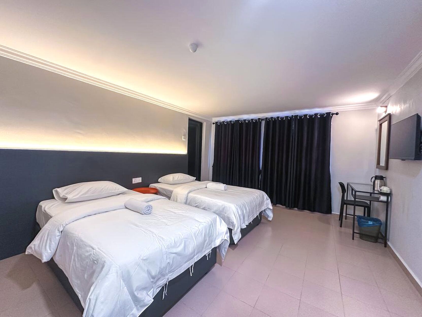 Desk, laptop workspace, free WiFi, bed sheets