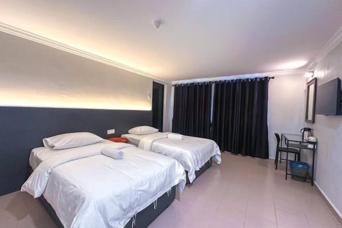 Desk, laptop workspace, free WiFi, bed sheets