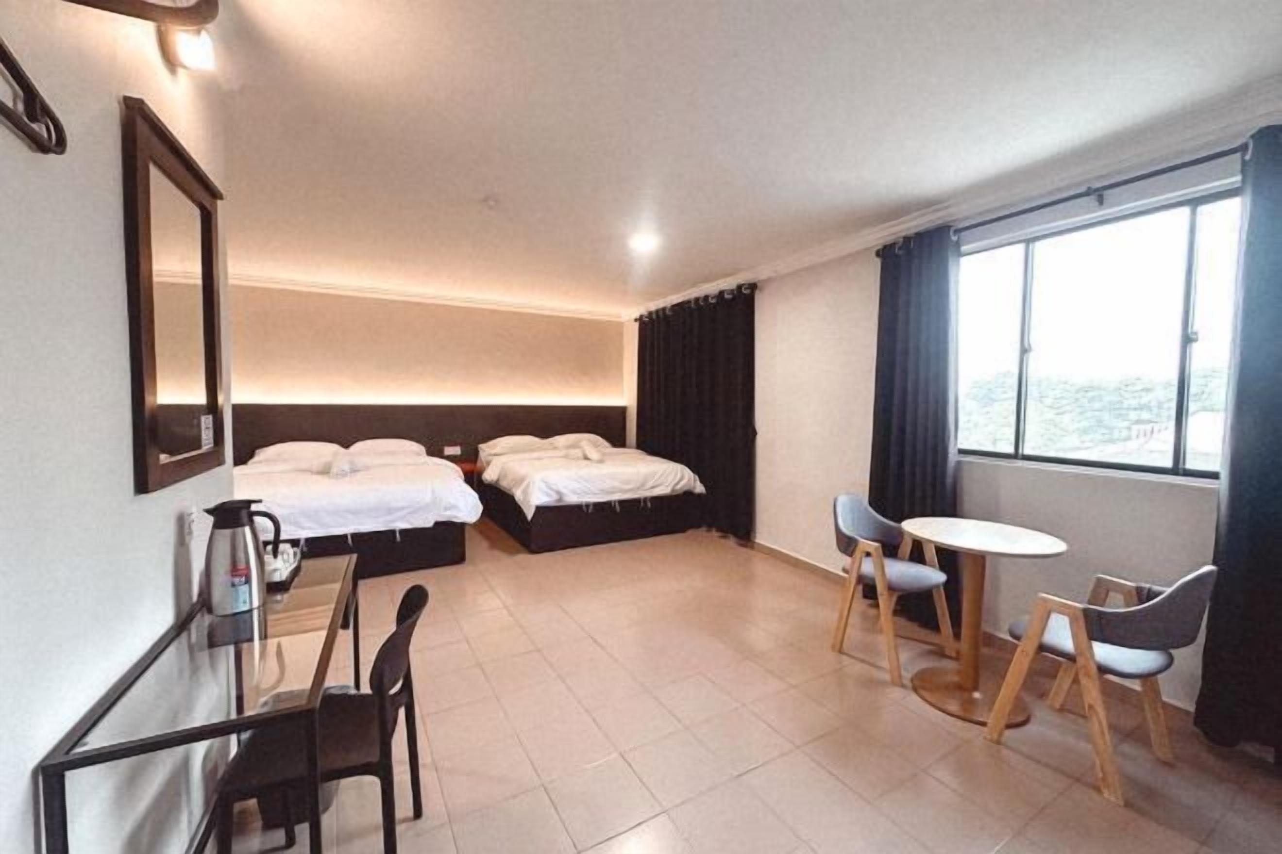 Desk, laptop workspace, free WiFi, bed sheets