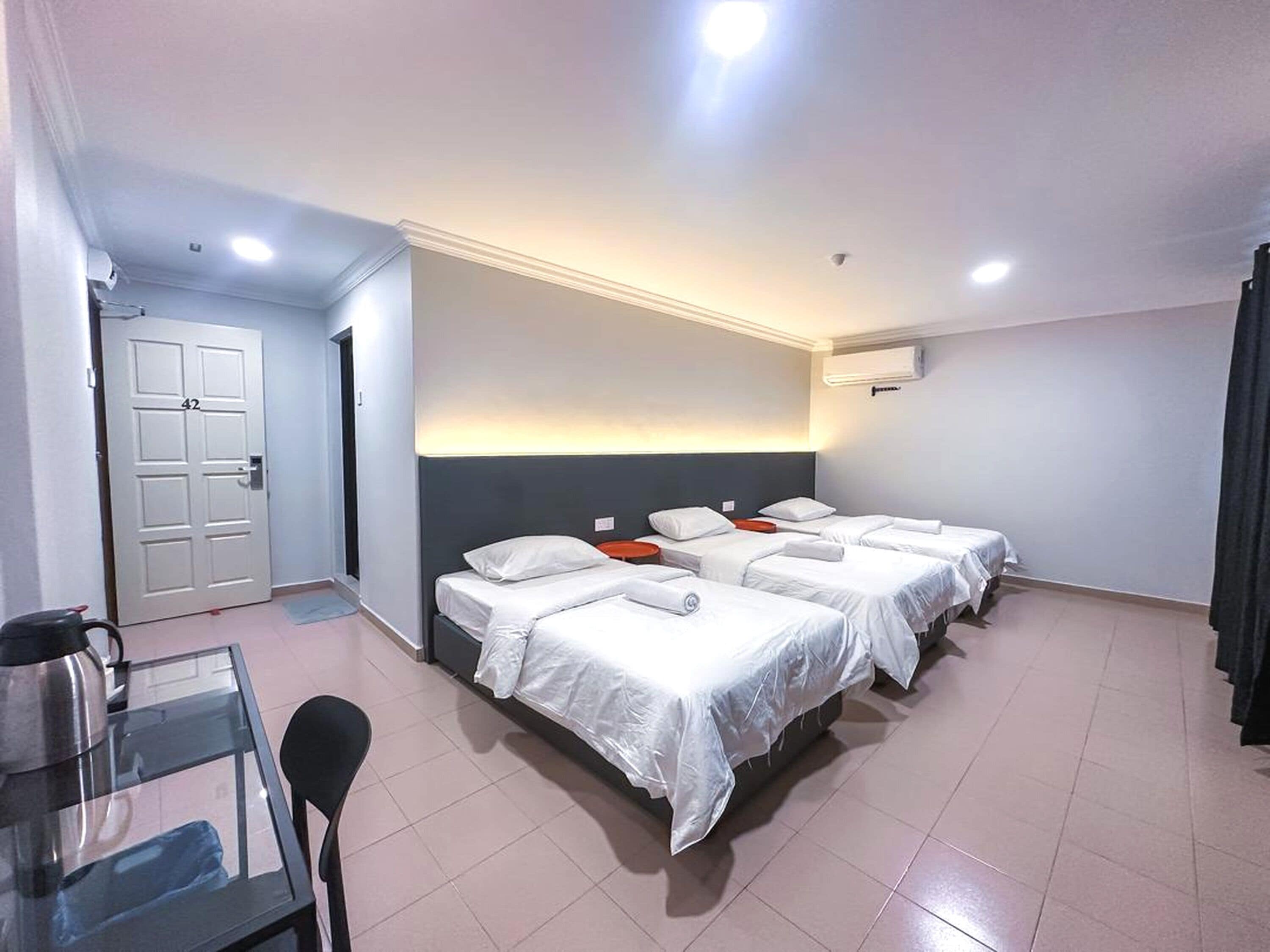 Desk, laptop workspace, free WiFi, bed sheets