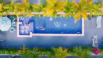 Indoor pool, outdoor pool, pool umbrellas, pool loungers