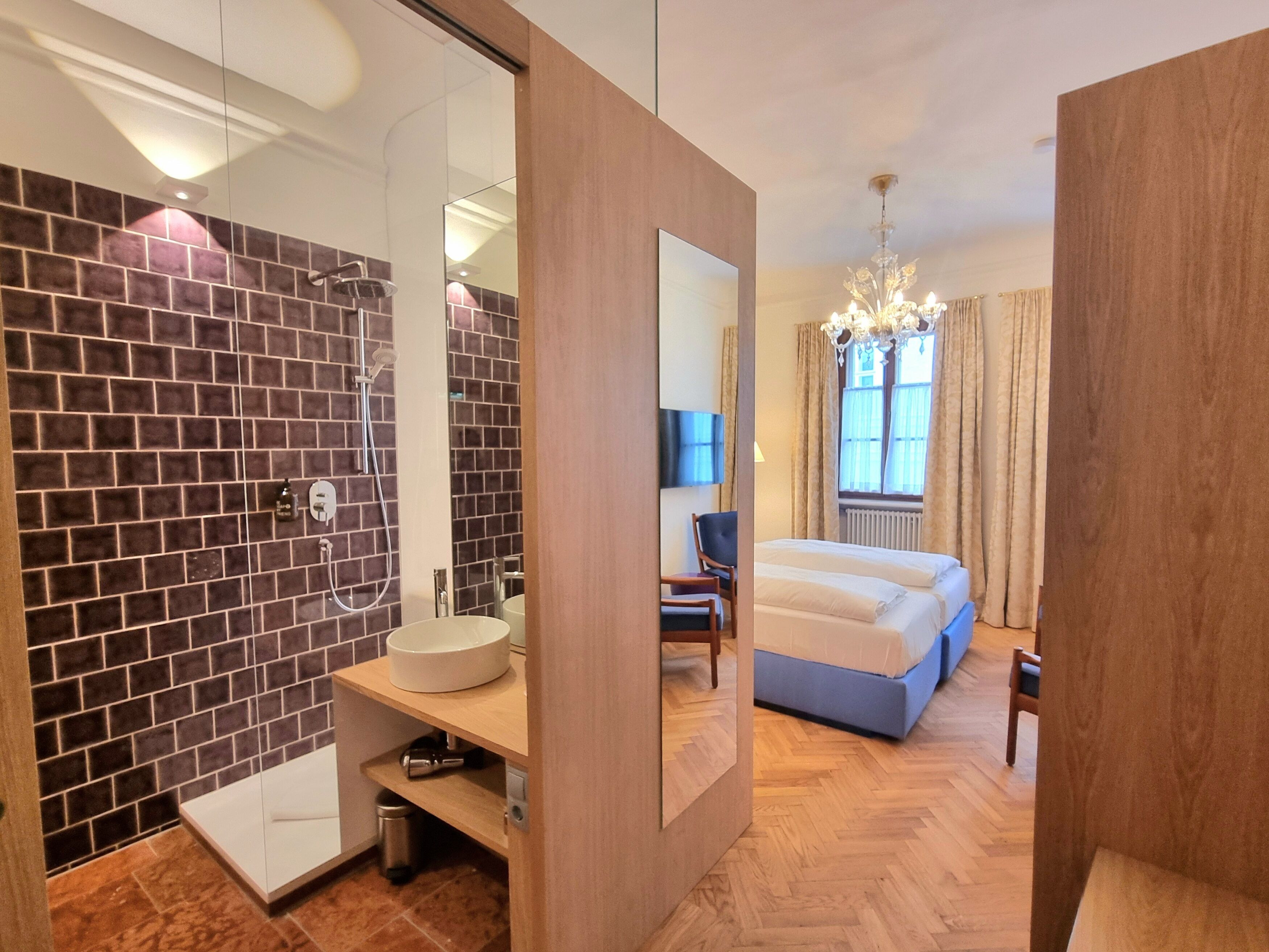 superior double room | bathroom | free toiletries, hair dryer, towels, soap