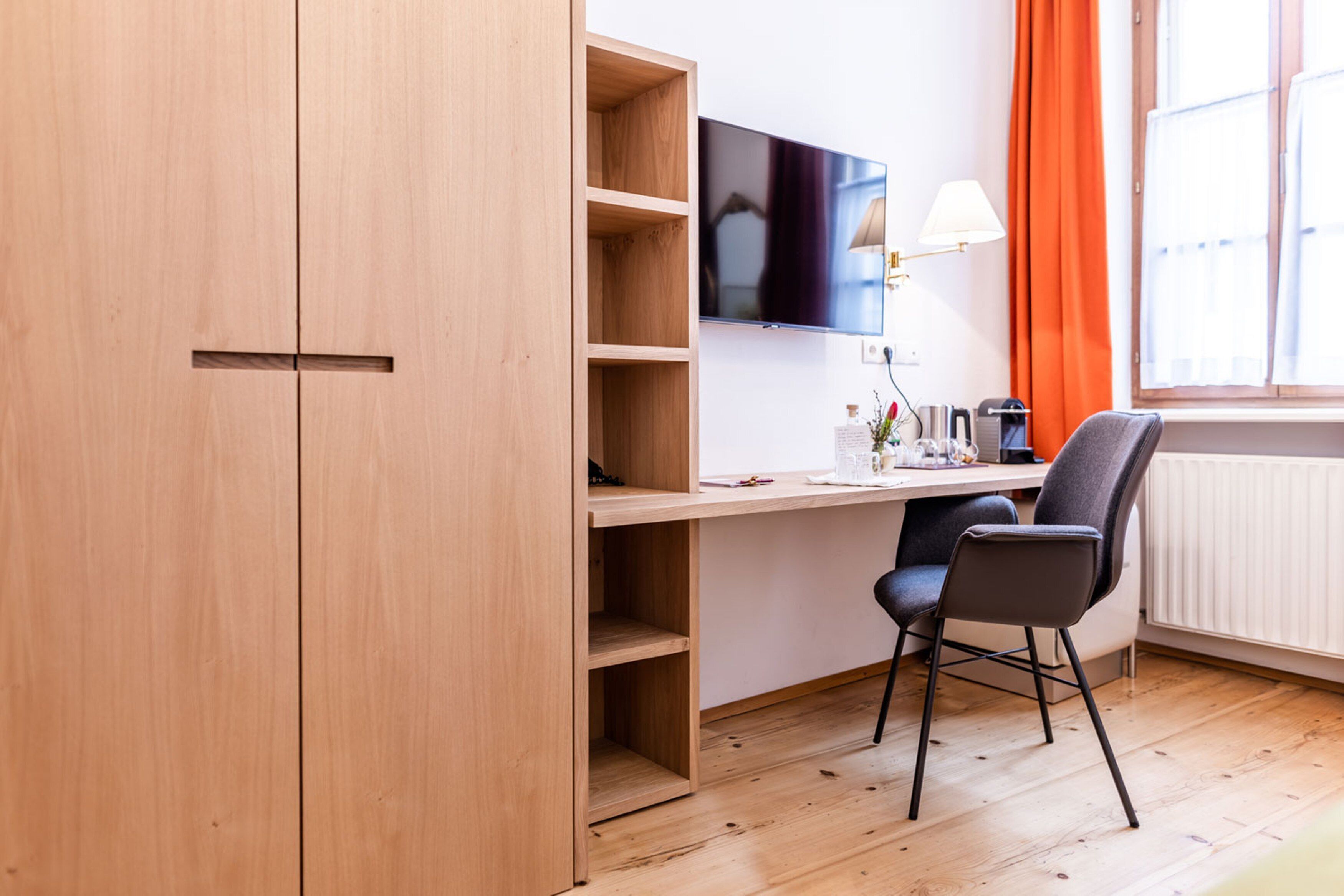 classic double room | living area | 58-inch flat-screen tv with cable channels, tv