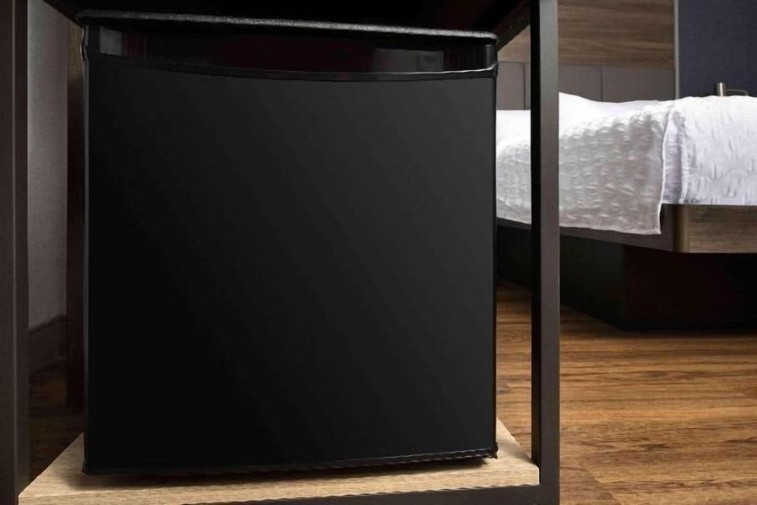 Desk, laptop workspace, blackout drapes, iron/ironing board