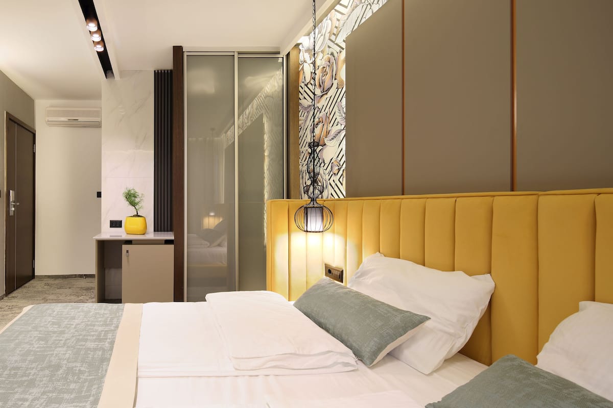 Select Comfort beds, minibar, in-room safe, desk