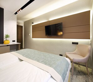 Select Comfort beds, minibar, in-room safe, desk