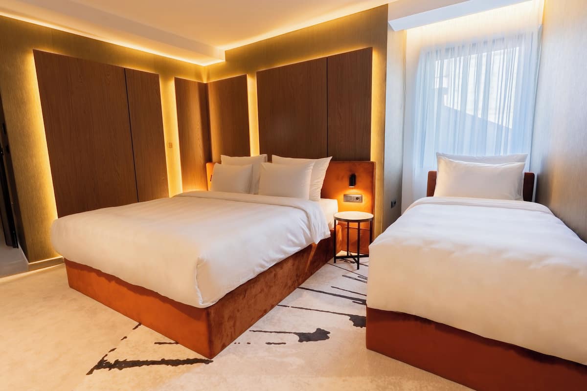 Family Triple Room | Select Comfort beds, minibar, in-room safe, desk
