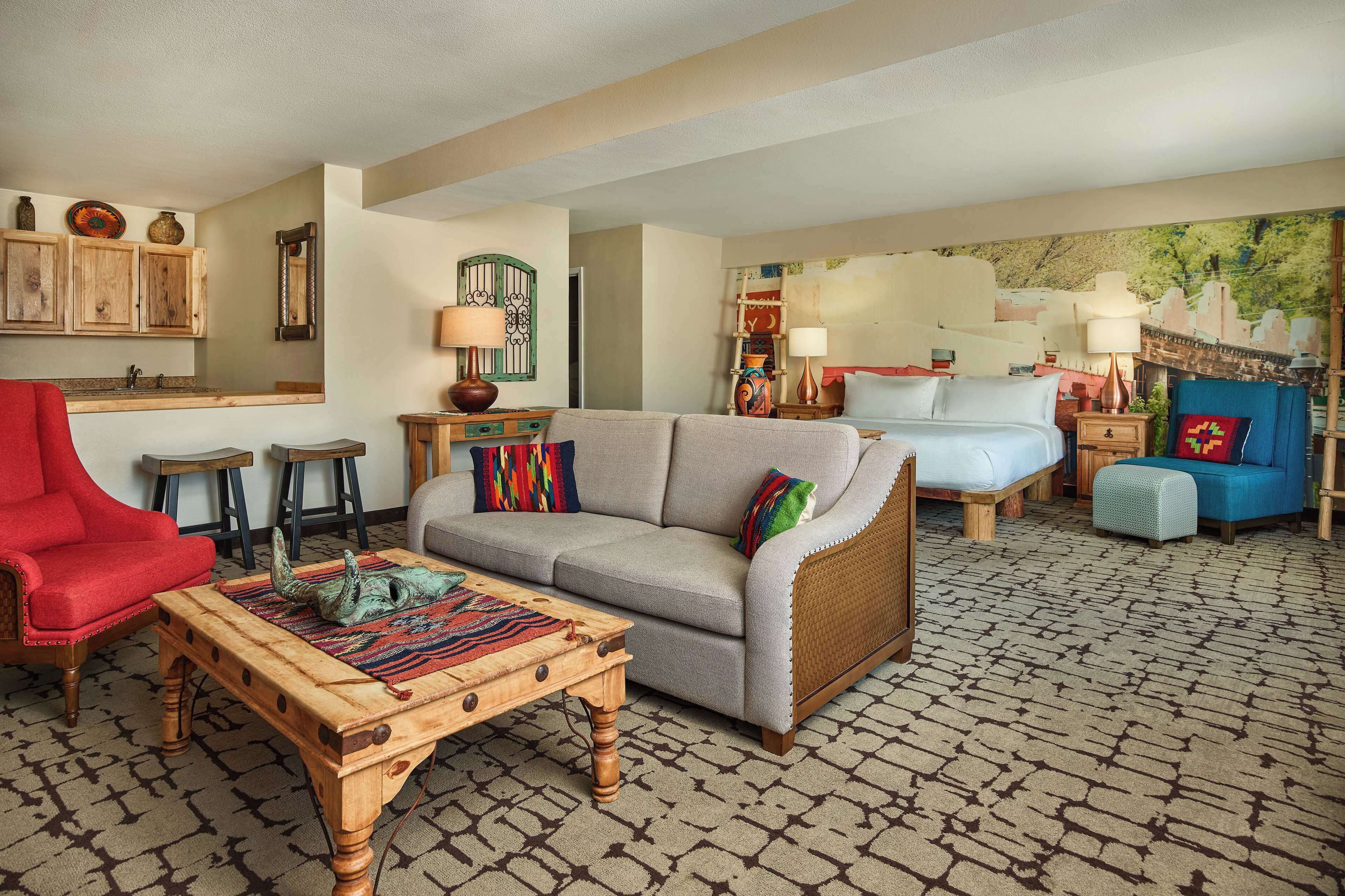 room, 1 king bed | living area | 55-inch flat-screen tv with cable channels, tv