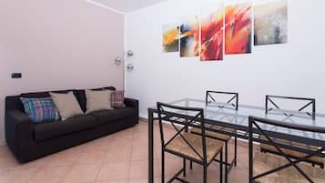 Appartamento (1 Bedroom) | Area soggiorno | TV a schermo piatto