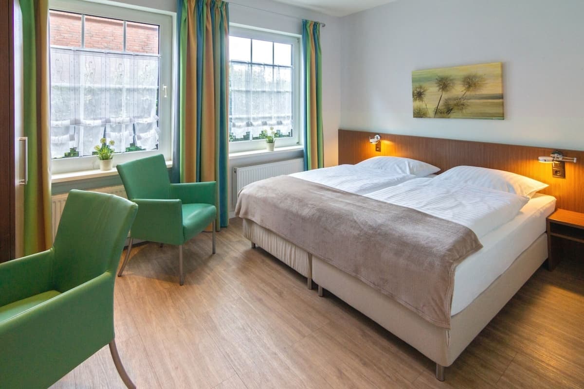 comfort double room | in-room safe, individually decorated, desk, blackout curtains