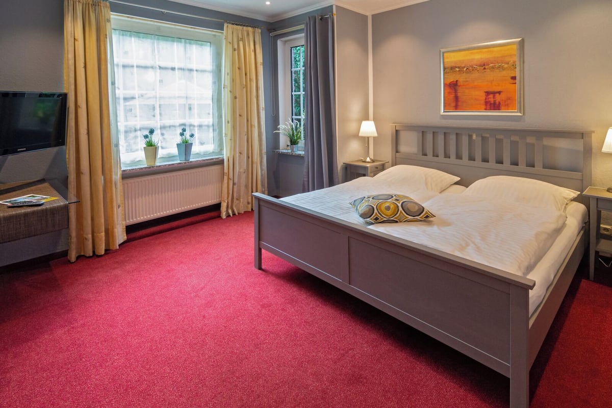 comfort double room | in-room safe, individually decorated, desk, blackout curtains