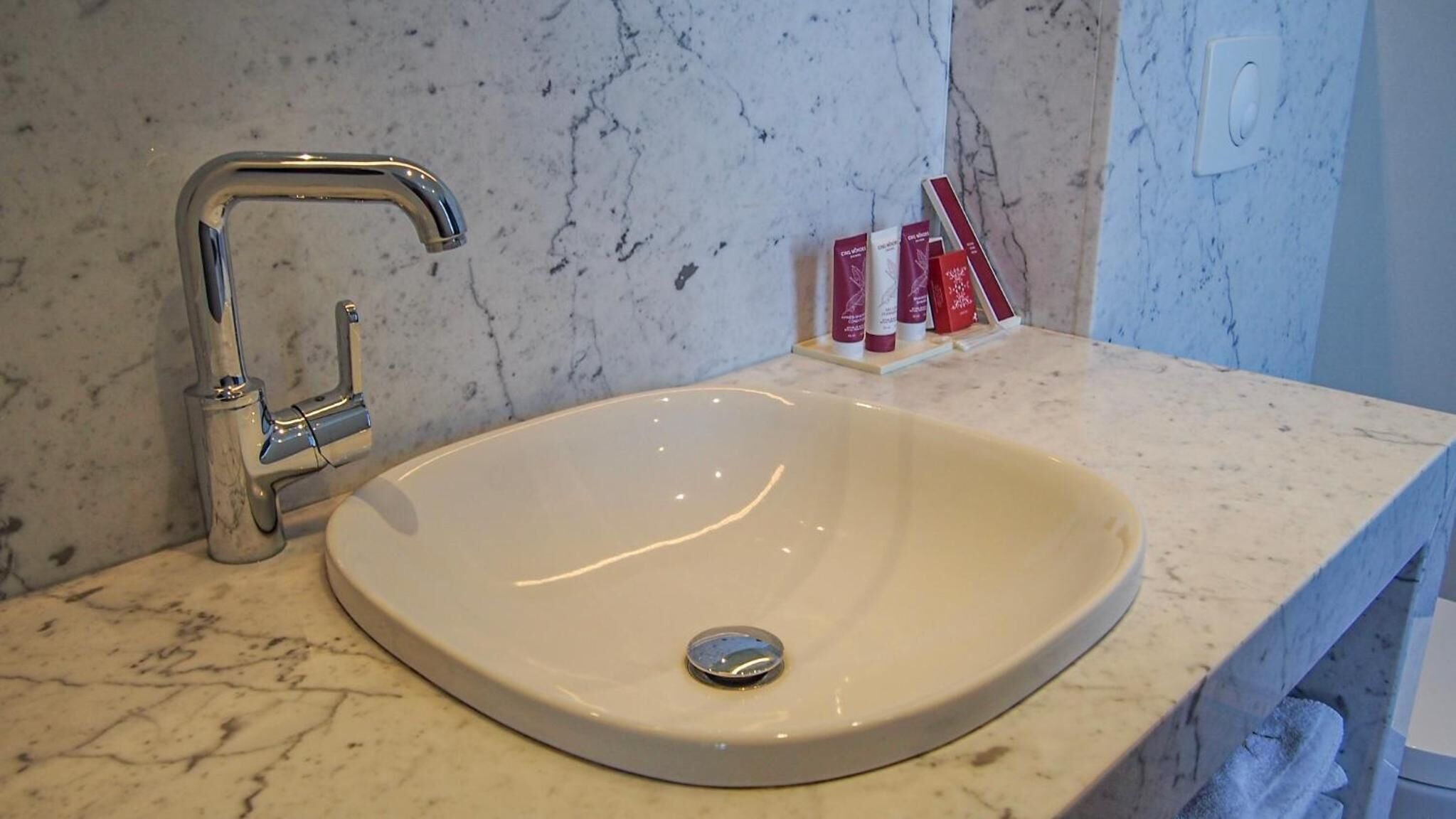 free toiletries, hair dryer, slippers, towels