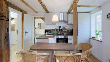 Apartment, Multiple Beds, Garden View | Private kitchen | Full-sized fridge, microwave, oven, stovetop