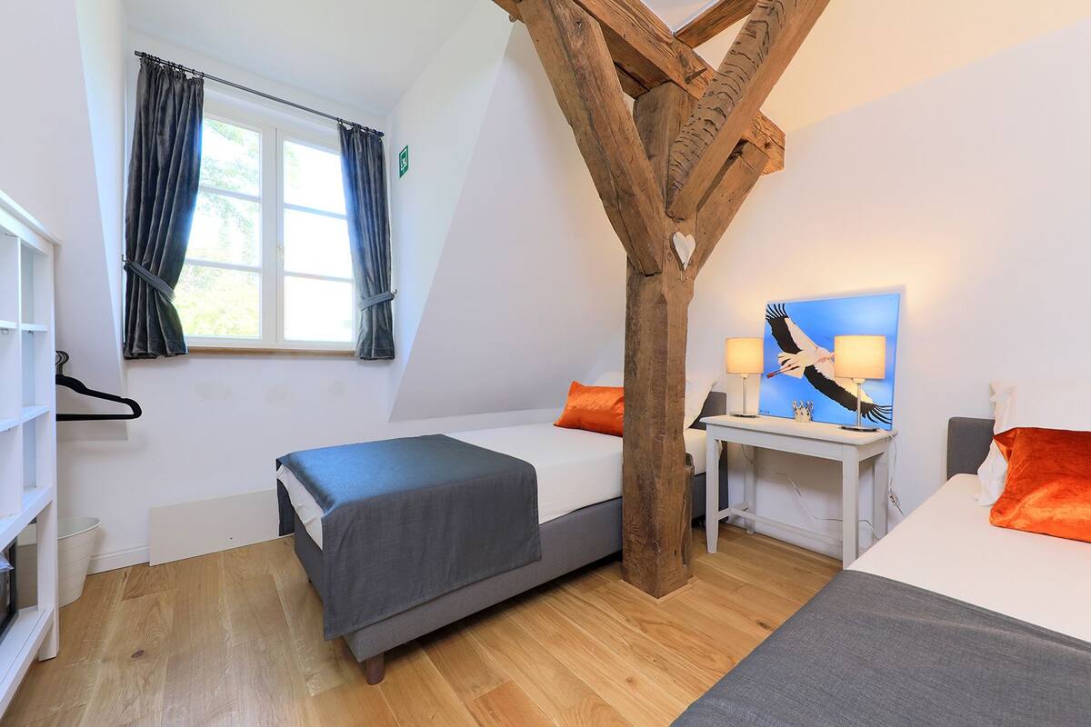 Appartement, meerdere bedden, uitzicht op tuin | Een kluis op de kamer, individueel gedecoreerd, individueel gemeubileerd