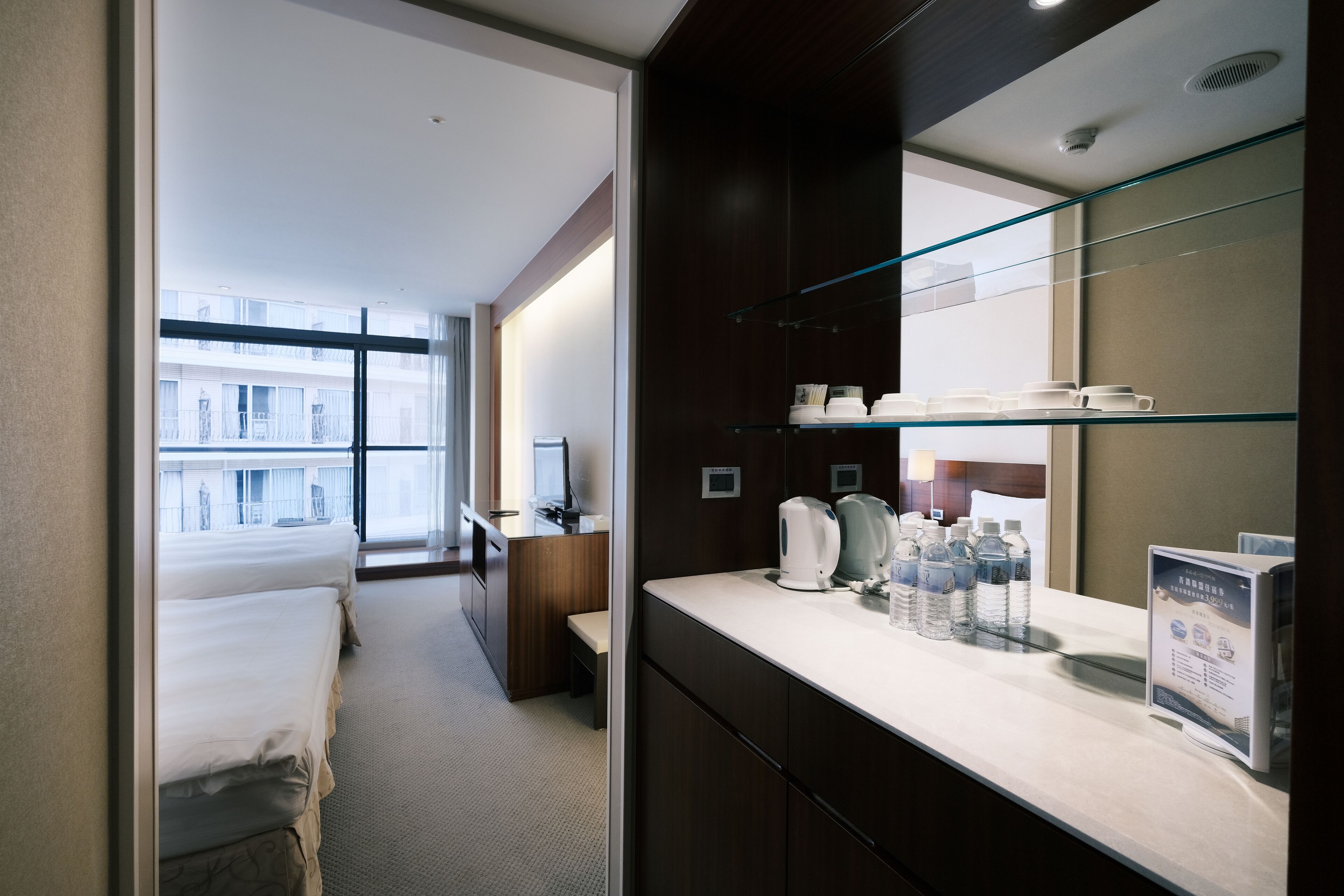 quadruple room (street view) | in-room safe, blackout curtains, iron/ironing board, free wifi