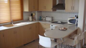 Vila família | Área de estar | TV de tela plana