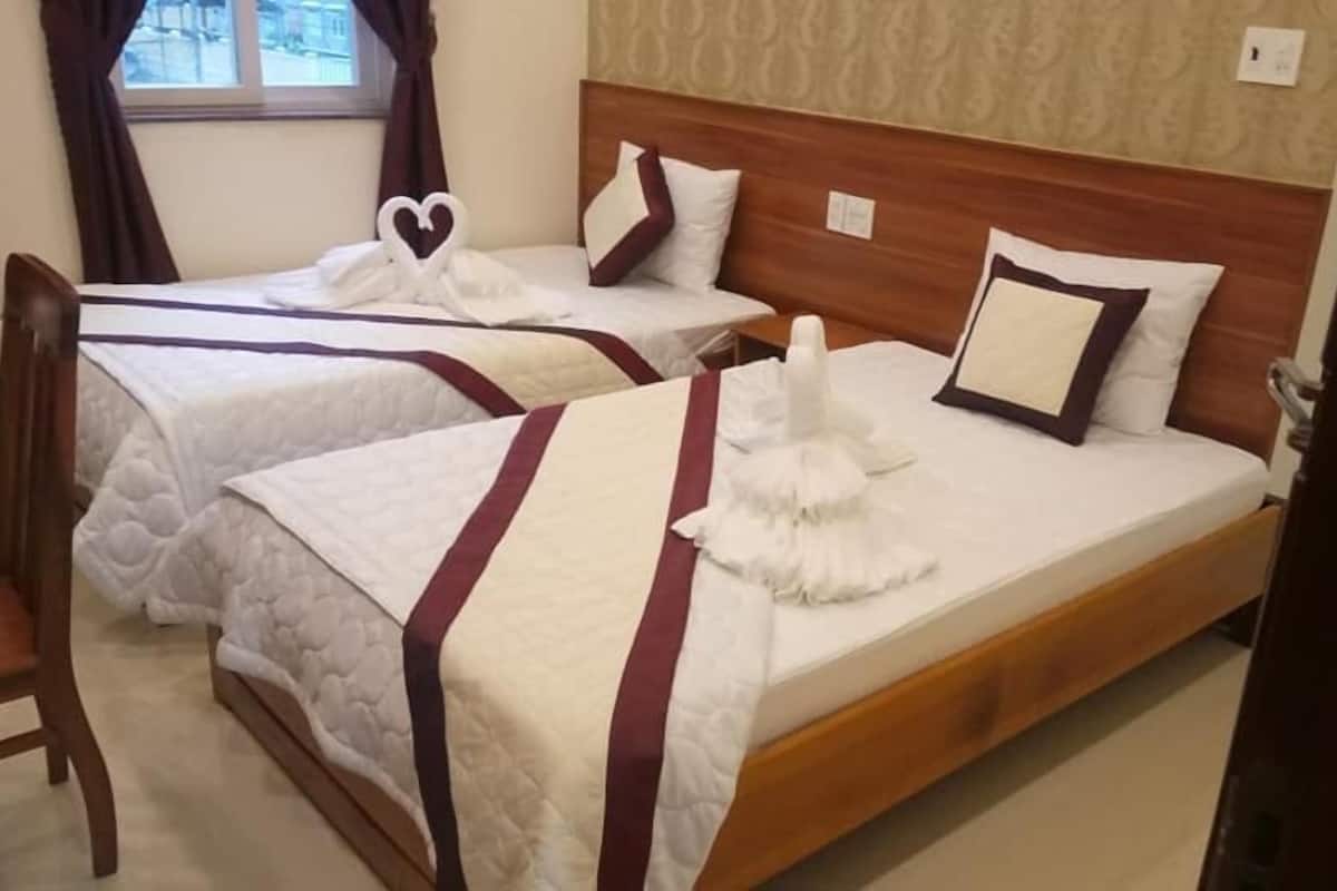 Habitación superior con 2 camas individuales, vista al mar | Escritorio, wifi gratis y ropa de cama