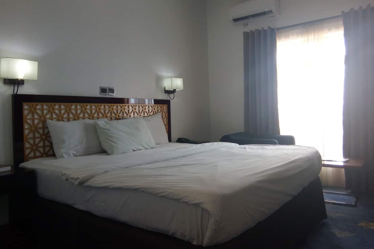 Superior Room | In-room safe, desk, laptop workspace, blackout drapes
