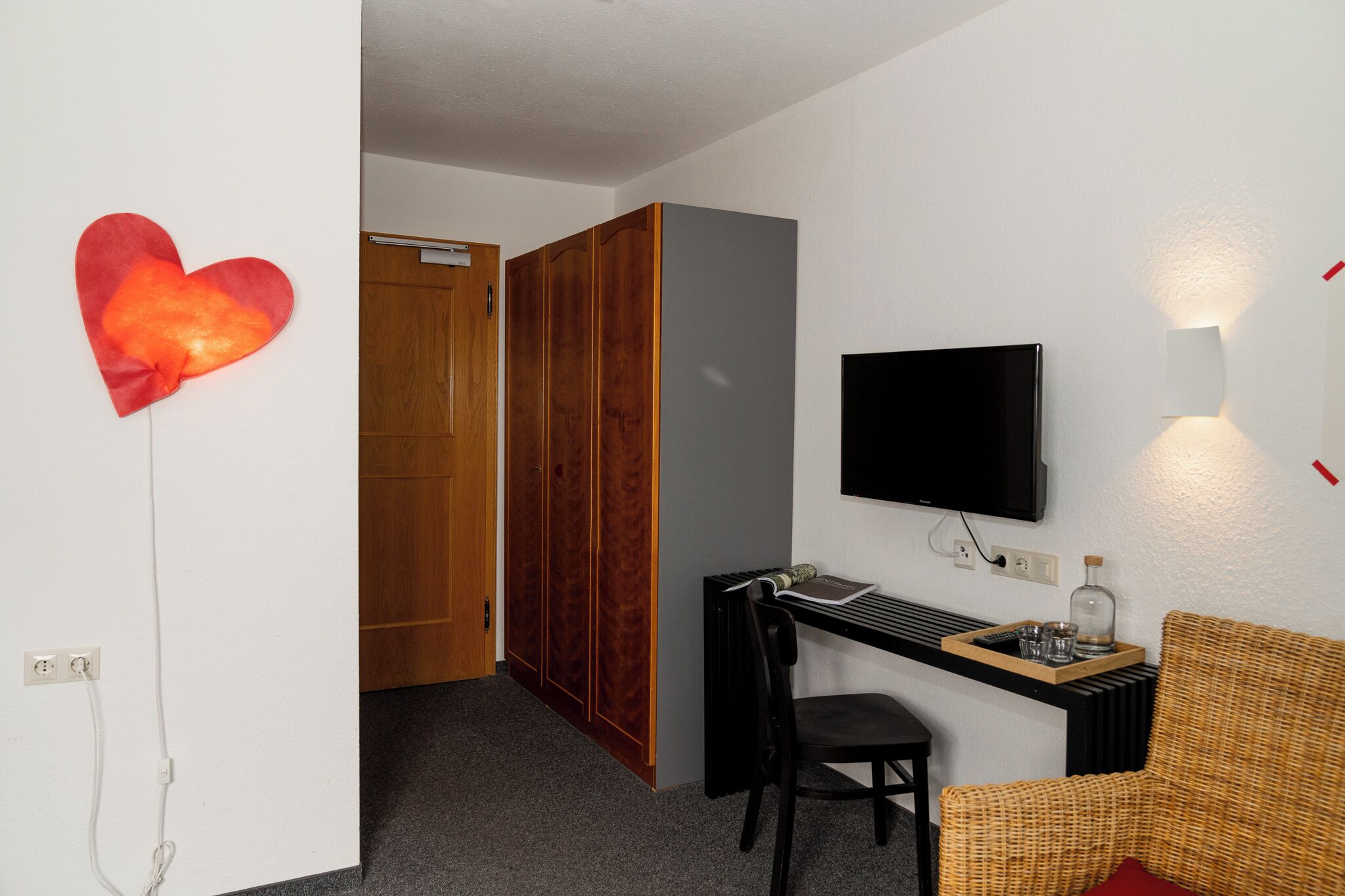 family suite | living area | 32-inch flat-screen tv with satellite channels