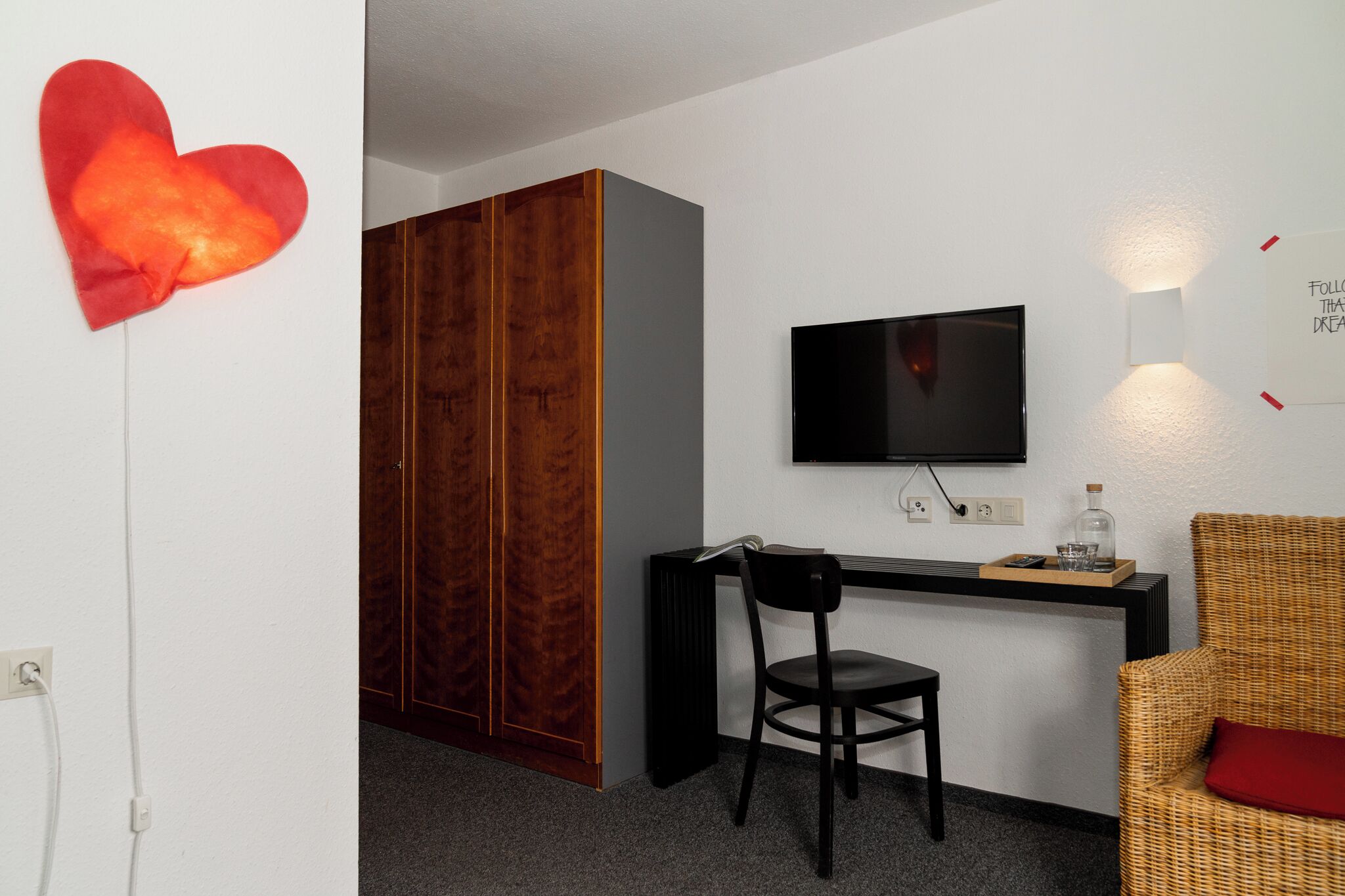 family suite | living area | 32-inch flat-screen tv with satellite channels