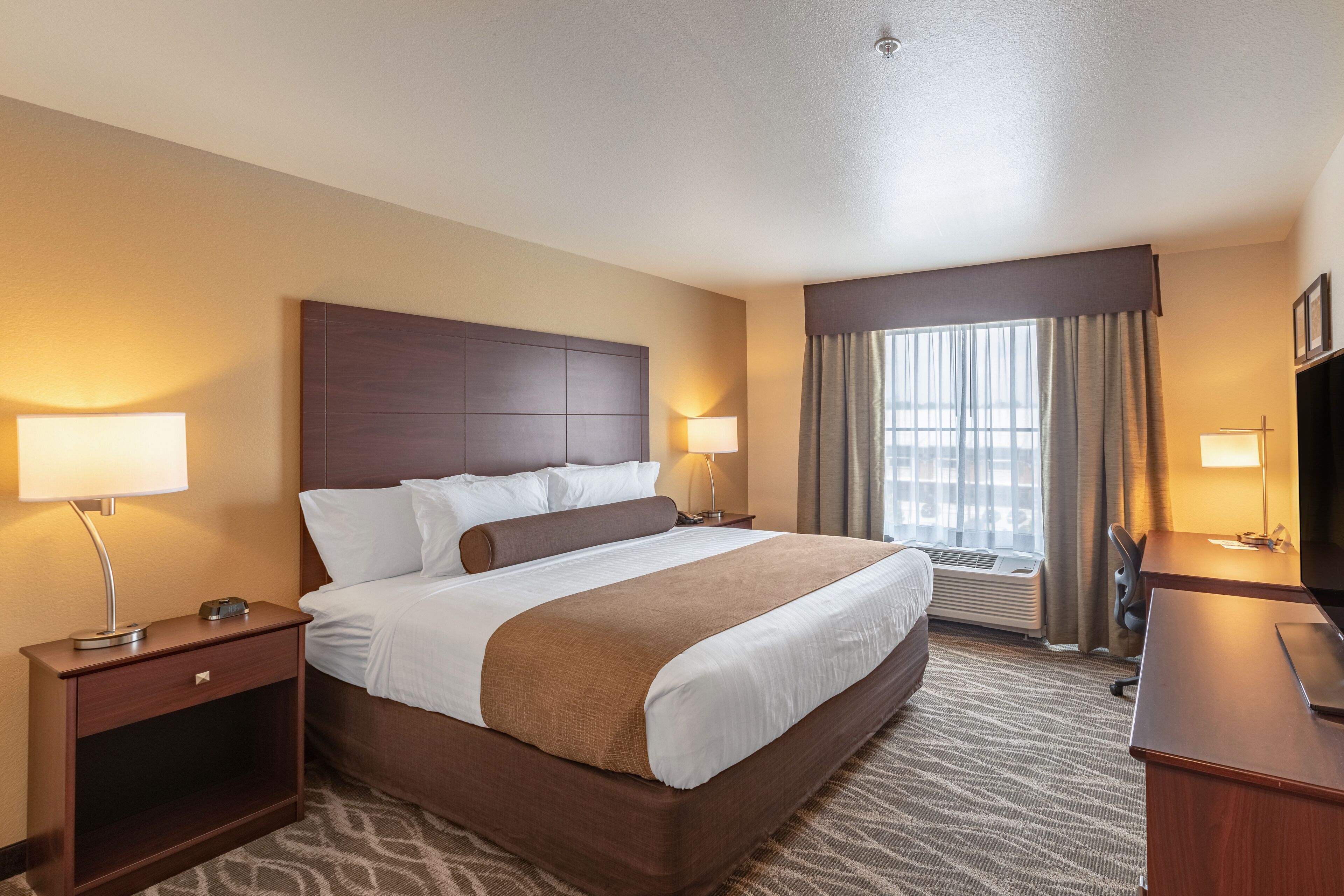 premium bedding, down duvets, pillow-top beds, in-room safe