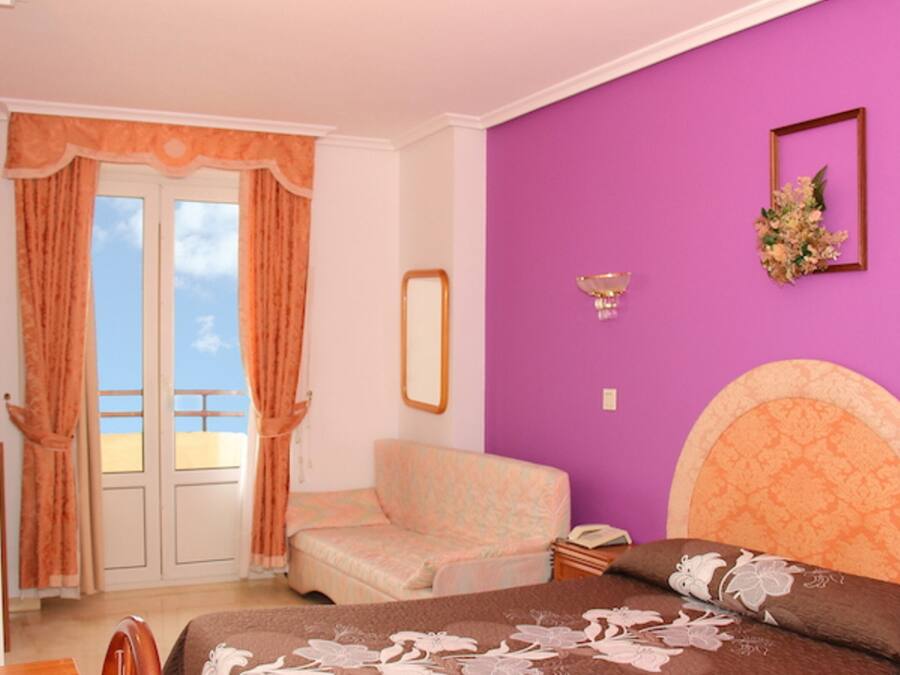 Triple Room | Desk, laptop workspace, blackout drapes, free WiFi