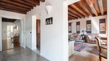 Apartment, 2 Bedrooms | Living room | 26-inch flat-screen TV with cable channels, TV, DVD player