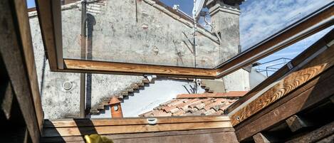 Departamento, Terraza | Cocineta privada | Refrigerador con congelador, microondas, horno y parrilla de estufa