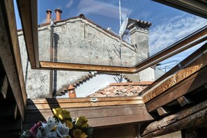 Departamento, Terraza | Cocineta privada | Refrigerador con congelador, microondas, horno y parrilla de estufa