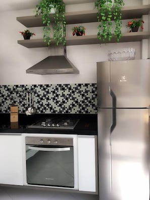 Apartamento, 2 camas de casal | Cozinha privada | Geladeira grande, micro-ondas, fogão, cooktop