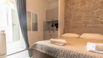 Suite estudio urbana | Cocineta privada | Tetera eléctrica