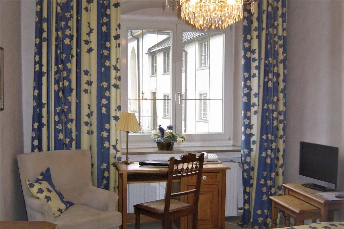 Desk, blackout curtains, soundproofing, iron/ironing board (on request)