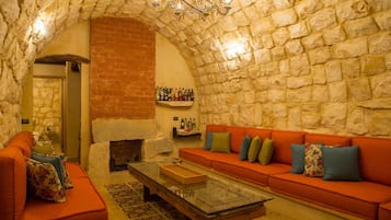 Luxury Villa, 2 Bedrooms, Garden View | Living room | 40-inch flat-screen TV with satellite channels, TV, fireplace
