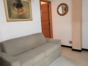 Apartamento | Sala de estar | TV de tela plana