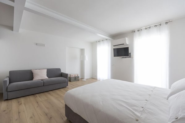 Premium bedding, down duvets, memory-foam beds, in-room safe