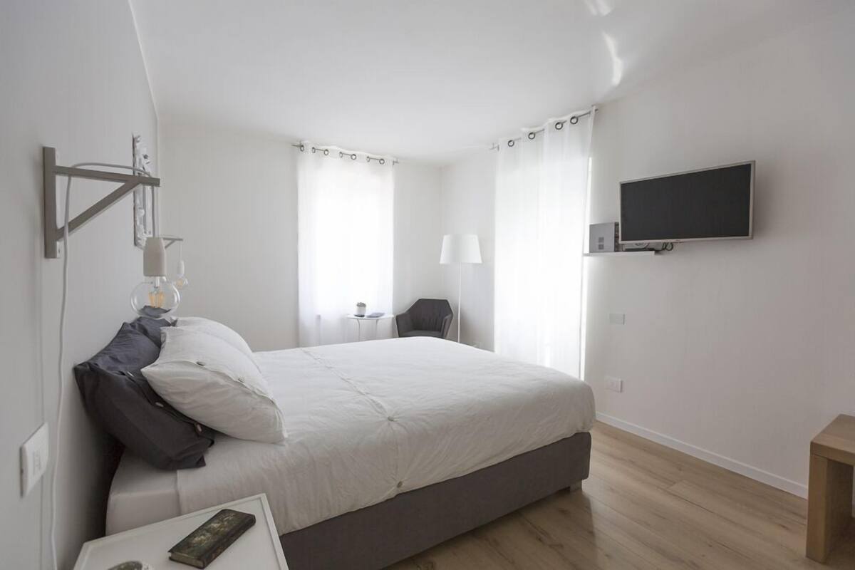 Premium bedding, down duvets, memory-foam beds, in-room safe