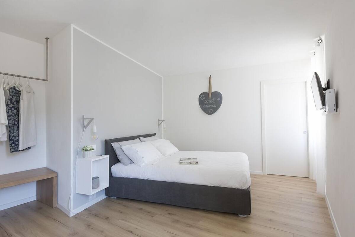 Premium bedding, down duvets, memory-foam beds, in-room safe