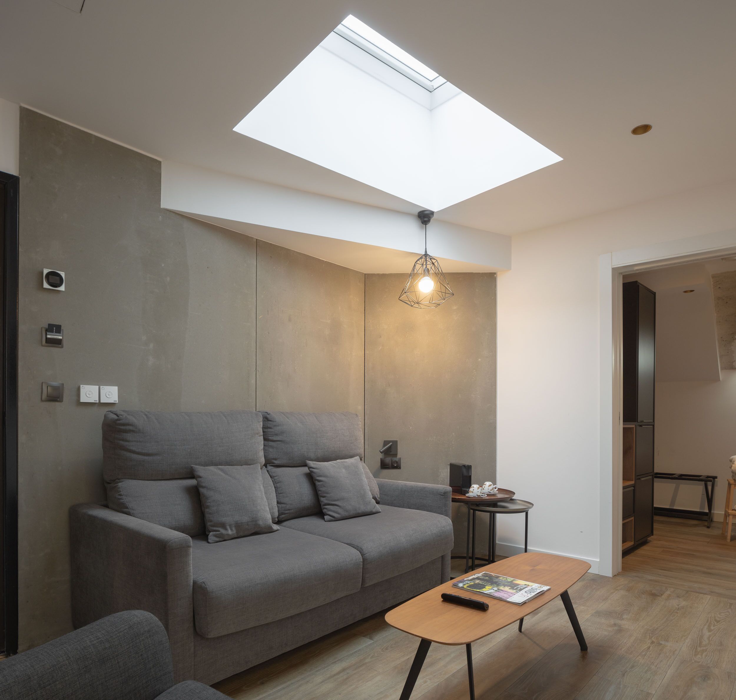 tayko tower suite | living area | tv